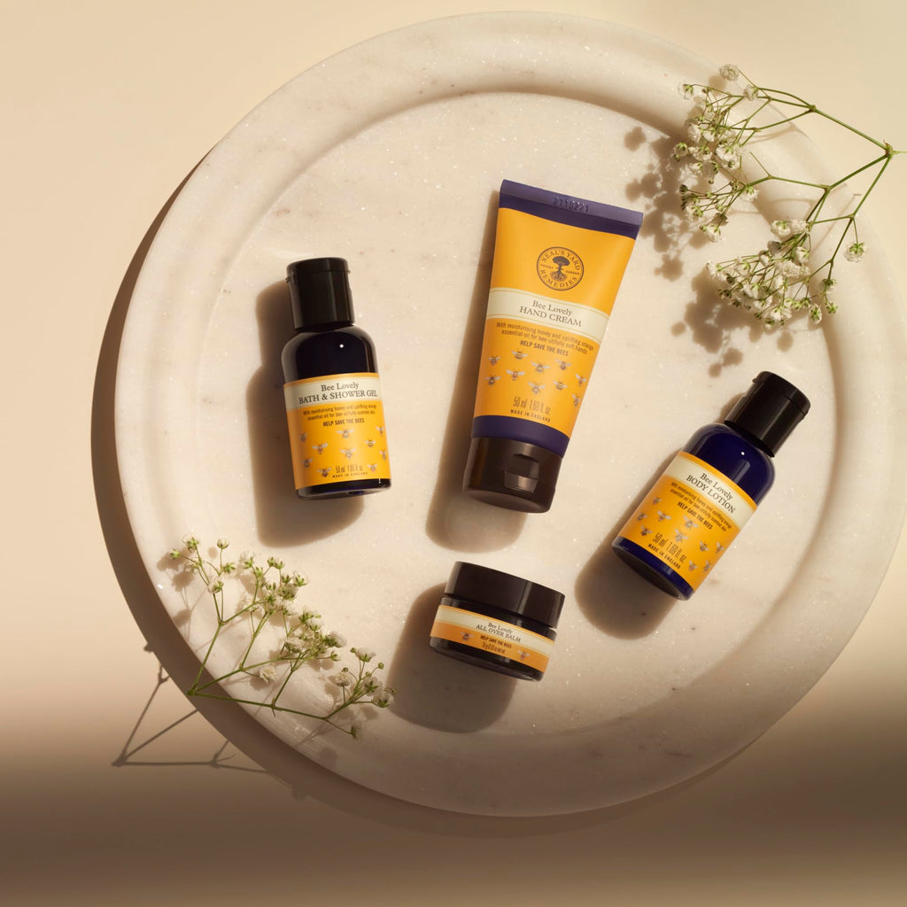 Neal's Yard Remedies | Bee Lovely Nourishing Collection | Set of Hand Cream, Shower Gel, Body Lotion & All Over Balm | Gifts for Women | Pack of 4 - Damaged Box