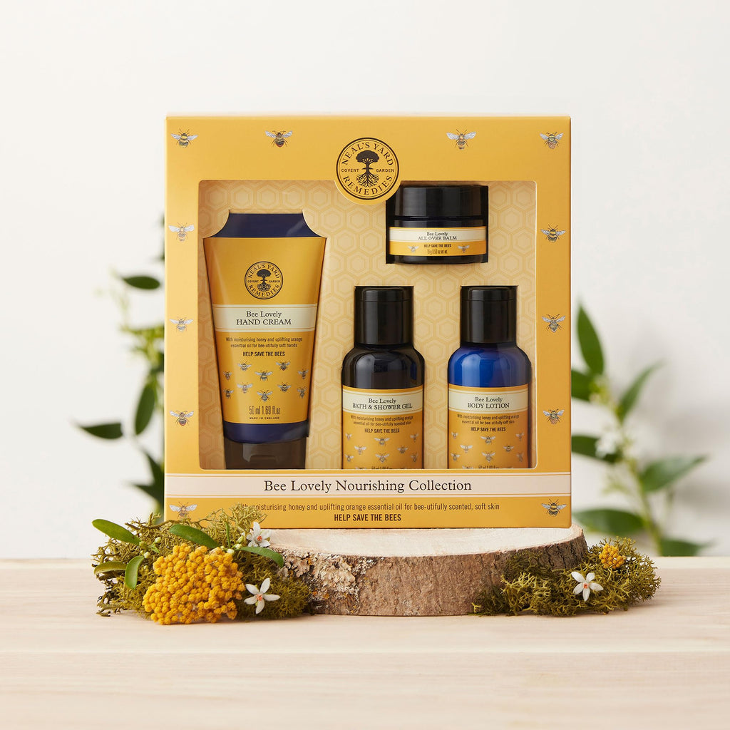 Neal's Yard Remedies | Bee Lovely Nourishing Collection | Set of Hand Cream, Shower Gel, Body Lotion & All Over Balm | Gifts for Women | Pack of 4 - Damaged Box